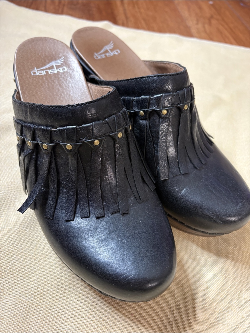Dansko Black Leather Fringe Clog Mules